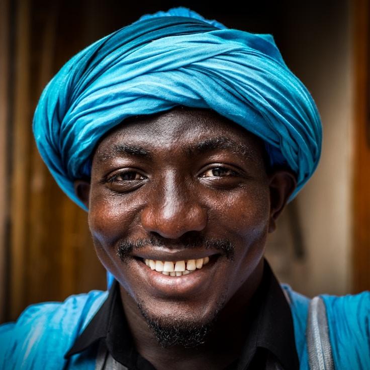 Kaveri Mehta, Lead Design Curator at RouteHarborLane, reviewing corporate floral arrangements